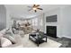 Inviting living room open to the kitchen features a cozy fireplace and stylish decor at 1957 Tablerock Dr # 59, York, SC 29745
