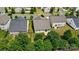 Aerial view of a fenced backyard with lawn and patio at 1957 Tablerock Dr # 59, York, SC 29745