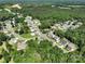 An aerial view of a community surrounded by mature trees at 201 Vanderbilt Blvd, Locust, NC 28097