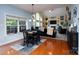 Bright dining area with hardwood floors, window with lots of natural light, next to the Gathering room at 201 Vanderbilt Blvd, Locust, NC 28097