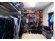 This walk-in closet provides ample storage with organized shelving and hanging space for clothes and accessories at 201 Vanderbilt Blvd, Locust, NC 28097