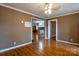 Spacious living room with laminate flooring leading to the kitchen at 205 Stowe Acres Rd, Kings Mountain, NC 28086