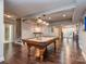 Finished basement with a pool table, recessed lighting, and hardwood floors, perfect for entertaining at 2301 Keara Way, Charlotte, NC 28270