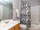 Neutral bathroom features walk in shower and single vanity at 2301 Keara Way, Charlotte, NC 28270