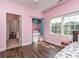Bright bedroom with a closet, a window offering plenty of natural light and featuring hardwood floors and a ceiling fan at 2301 Keara Way, Charlotte, NC 28270