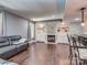 Inviting living room featuring a cozy fireplace, built-in shelves, and a comfortable leather sofa at 2301 Keara Way, Charlotte, NC 28270