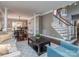 Open-concept living area with hardwood floors, stylish furnishings, and natural light at 2301 Keara Way, Charlotte, NC 28270