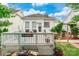 Backyard with garden area and deck offers an inviting space for outdoor living at 23128 Goose Down Ln, Lancaster, SC 29720