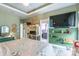 Light-filled bedroom with built-in desk and television at 23128 Goose Down Ln, Lancaster, SC 29720