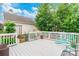Relaxing outdoor deck with bench, offers a cozy space for enjoying the backyard garden at 23128 Goose Down Ln, Lancaster, SC 29720