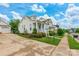 Charming home with manicured front yard and sidewalk, exudes curb appeal and neighborhood charm at 23128 Goose Down Ln, Lancaster, SC 29720