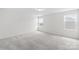 Spacious, bright bedroom with plush carpet and multiple windows offering pleasant views and natural light at 2322 Joes Lake Rd, Shelby, NC 28152