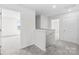 Bright hallway featuring neutral walls, carpeted floors, and white doors for a clean, modern aesthetic at 2322 Joes Lake Rd, Shelby, NC 28152