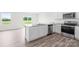 Modern kitchen features white cabinets, granite countertops, and stainless steel appliances at 2322 Joes Lake Rd, Shelby, NC 28152