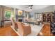 Bright living room with hardwood floors, a fireplace, and neutral tones throughout at 2329 Club Rd, Charlotte, NC 28205