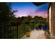 Balcony featuring sunset view with potted plants at 2338 Yadkin Ave # D302, Charlotte, NC 28205
