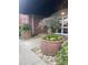 Inviting entrance with landscaped planters, stone details, and brick architecture at 2338 Yadkin Ave # D302, Charlotte, NC 28205