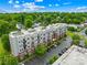 Exterior view of the condo complex featuring a parking lot at 2338 Yadkin Ave # D302, Charlotte, NC 28205