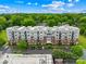 Condo complex exterior with parking and balcony views at 2338 Yadkin Ave # D302, Charlotte, NC 28205