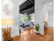 Inviting entryway seamlessly connects to the open living space with exposed ceilings and modern decor at 2338 Yadkin Ave # D302, Charlotte, NC 28205