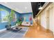 Inviting condo lobby with comfortable seating and bright windows at 2338 Yadkin Ave # D302, Charlotte, NC 28205