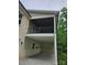 Exterior view of a covered back patio with ceiling and brick accents at 2442 Falcon Ln, Statesville, NC 28625
