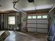 An unfinished garage ready for customization and providing ample space and a modern door at 2442 Falcon Ln, Statesville, NC 28625