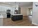 Spacious kitchen featuring white cabinets, stainless steel appliances and island at 2442 Falcon Ln, Statesville, NC 28625