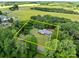 Aerial view of property with estimated boundary lines in a verdant, wooded setting at 24501 Canton Rd, Albemarle, NC 28001
