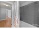 Bathroom with a tub/shower combo and tiled wall at 24501 Canton Rd, Albemarle, NC 28001