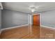 Bedroom with hardwood floors, neutral paint and closet at 24501 Canton Rd, Albemarle, NC 28001