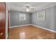 Cozy bedroom with hardwood floors, neutral walls, and ample natural light at 24501 Canton Rd, Albemarle, NC 28001