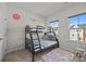 Bright bedroom with bunk beds, large windows and playful decor, perfect for  at 2665 Grantham Place Dr, Fort Mill, SC 29715