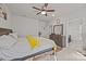 Comfortable bedroom with a large bed, neutral colors, and an en-suite bathroom at 2665 Grantham Place Dr, Fort Mill, SC 29715