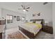 Spacious bedroom with a large bed, hardwood floors, and plenty of natural light at 2665 Grantham Place Dr, Fort Mill, SC 29715
