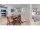 Dining room showcasing hardwood floors, modern lighting, and access to the kitchen at 2715 Selwyn Ave # 36, Charlotte, NC 28209