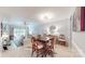 Formal dining room featuring hardwood floors, modern lighting, and an elegant dining set at 2715 Selwyn Ave # 36, Charlotte, NC 28209