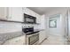 Well-lit kitchen featuring stainless steel appliances, granite counters, and white subway tile backsplash at 2715 Selwyn Ave # 36, Charlotte, NC 28209