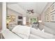 Spacious living room with fireplace, ceiling fan, and sliding glass doors to the outside at 2715 Selwyn Ave # 36, Charlotte, NC 28209