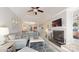 Inviting living room featuring a fireplace, modern furnishings, and seamless flow to dining area for gatherings at 2715 Selwyn Ave # 36, Charlotte, NC 28209