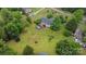 Aerial view of a large backyard, with mature trees, a deck, a pool, and a hot tub at 2906 Chapman Cir, Rock Hill, SC 29732