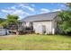 Spacious backyard with deck, pool, shed, and lush green lawn at 2906 Chapman Cir, Rock Hill, SC 29732