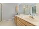Bright bathroom with double vanity sinks, cabinets and a glass-enclosed shower at 2906 Chapman Cir, Rock Hill, SC 29732