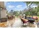 Spacious deck with a dining table, seating area and fire pit perfect for outdoor enjoyment at 2906 Chapman Cir, Rock Hill, SC 29732
