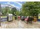 Outdoor deck area featuring a grill, seating, and a fire pit perfect for entertainment at 2906 Chapman Cir, Rock Hill, SC 29732