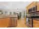 Open kitchen with stainless steel appliances and a view to the breakfast nook at 2906 Chapman Cir, Rock Hill, SC 29732