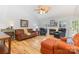 Spacious living room featuring a fireplace, hardwood floors, and abundant natural light at 2906 Chapman Cir, Rock Hill, SC 29732