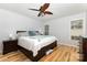Main bedroom featuring a ceiling fan, hardwood floors, neutral walls, and ample natural light at 2906 Chapman Cir, Rock Hill, SC 29732