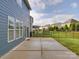 View of the backyard featuring a fence, patio, and exterior of the home at 3022 Burnello Ct, Iron Station, NC 28080