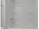 Bright white bathroom featuring a shower and tub combination at 3022 Burnello Ct, Iron Station, NC 28080